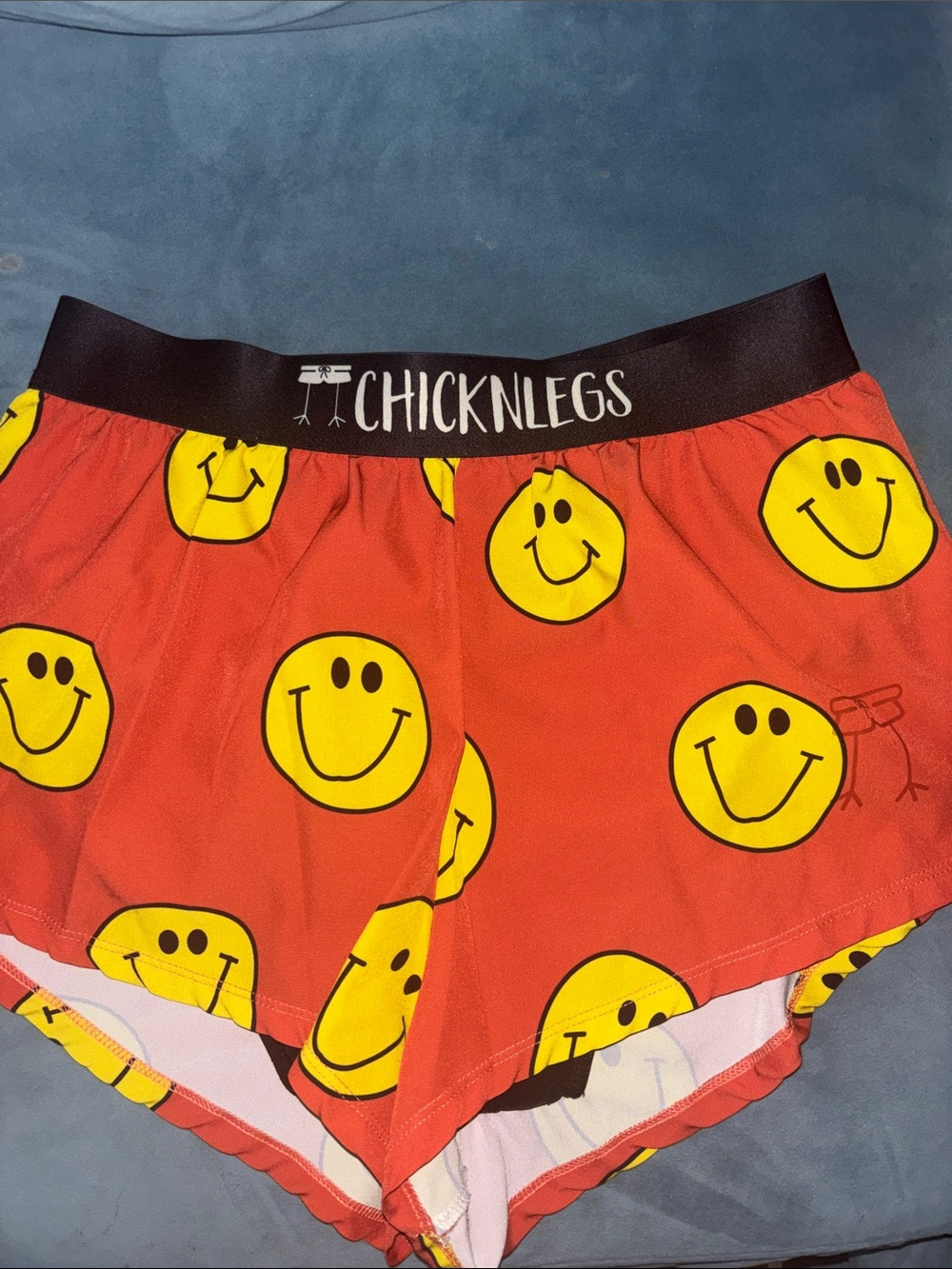 Chicknlegs Men’s Orange Smiley Athletic Shorts
